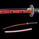 Vibrant katana with pink blade featuring yellow eye design, purple guard, and black and green handle. Michikatsu Tsugikuni Katana.