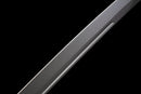 Iron Reaper Tactical Dao — high-carbon steel, Black textured handle, black ribbed polymer sheath with clip.
