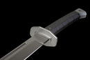 Iron Reaper Tactical Dao — high-carbon steel, Black textured handle, black ribbed polymer sheath with clip.