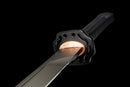 Champion Chopper Tactical Sword — Ceramic Edition — Black ergonomic grip, orange ring, black tactical, carbon fiber pattern