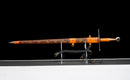 Aurantia Longsword — Spring Steel, Orange leather grip, silver steel guard/pommel, tooled orange leather scabbard.